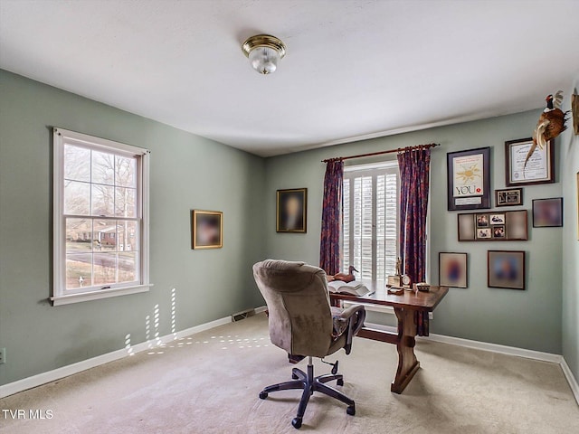 office area with light colored carpet