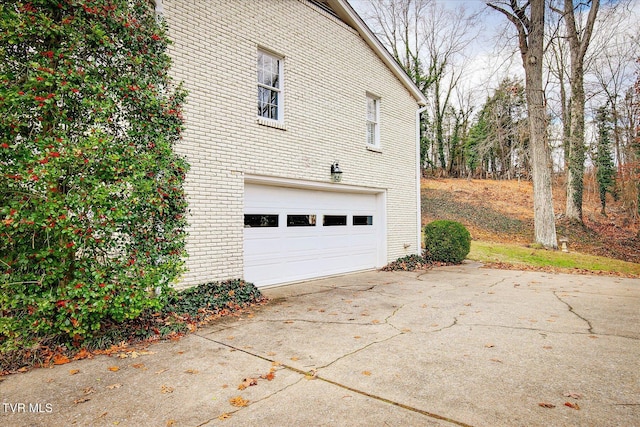 view of property exterior with a garage