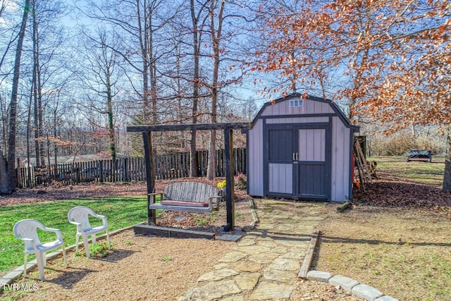 view of outbuilding featuring a yard