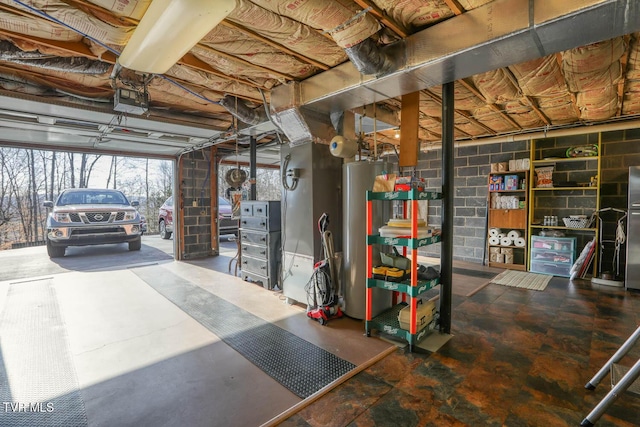 garage with gas water heater and a garage door opener