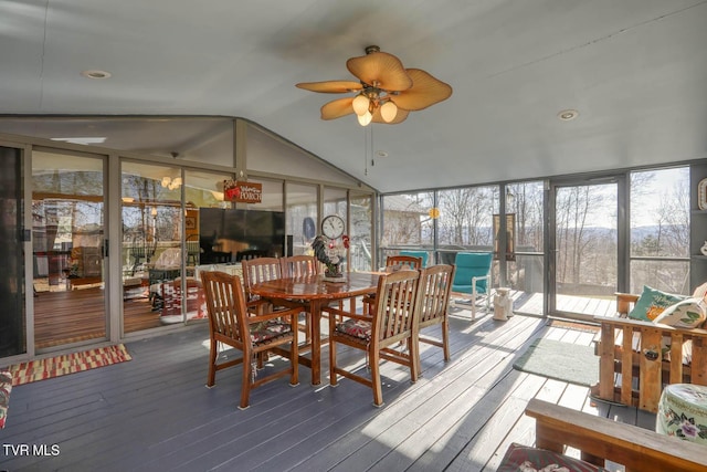 sunroom featuring ceiling fan and lofted ceiling