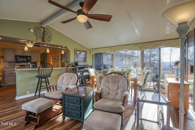 sunroom with vaulted ceiling with beams and ceiling fan