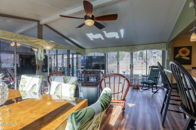 sunroom / solarium with vaulted ceiling with beams and ceiling fan