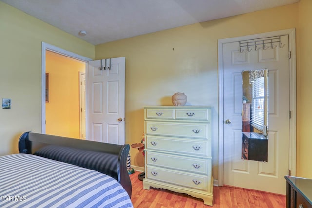 bedroom featuring light wood-type flooring