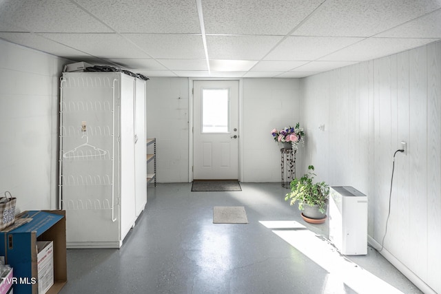 entrance foyer featuring a paneled ceiling