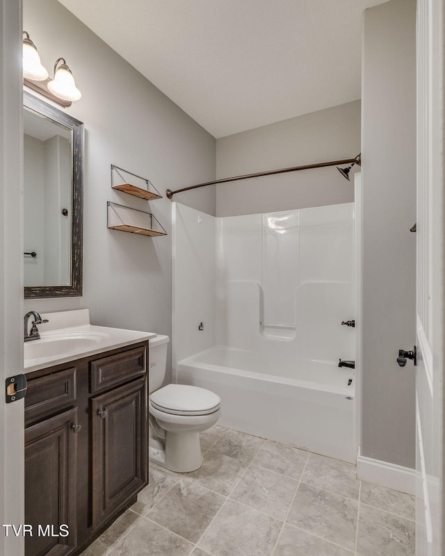 full bathroom with shower / tub combination, vanity, and toilet