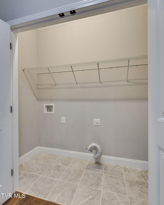 clothes washing area featuring washer hookup and hookup for an electric dryer