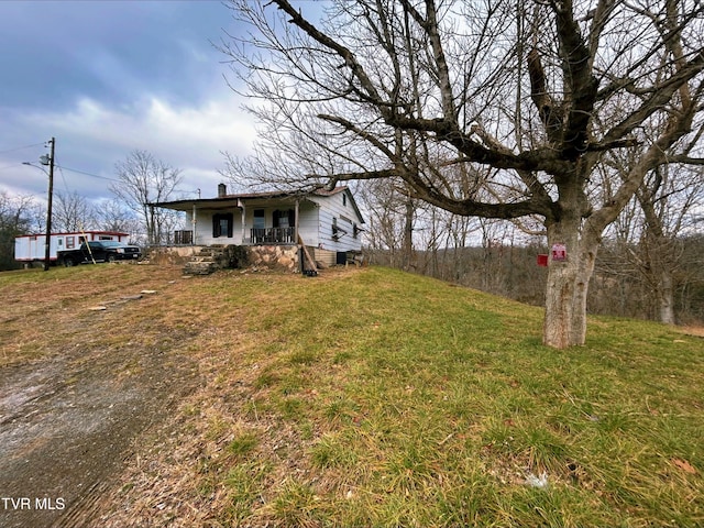 view of yard with a porch