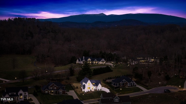 aerial view at dusk with a mountain view