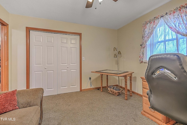 office with ceiling fan and carpet floors