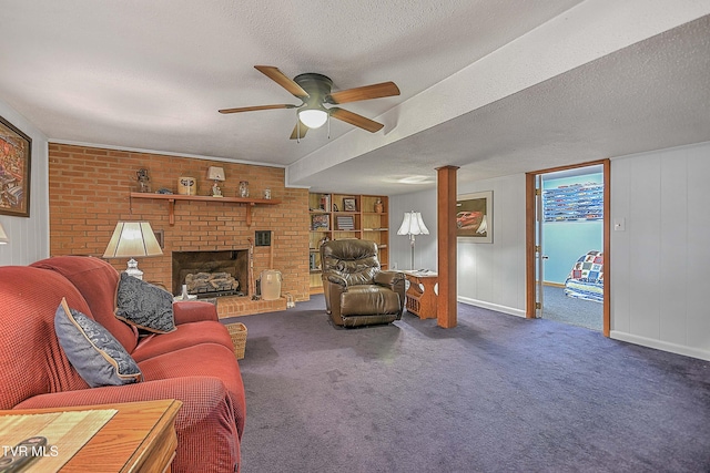 carpeted living room with a fireplace, ceiling fan, and a textured ceiling