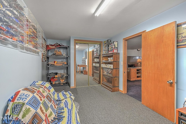 carpeted bedroom featuring a closet