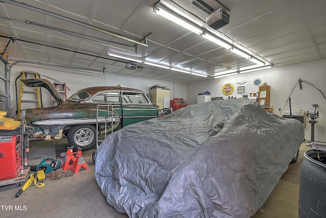 garage featuring a garage door opener