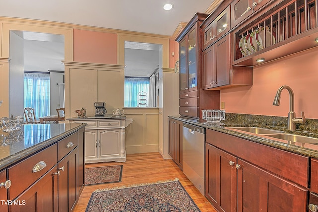 kitchen featuring light hardwood / wood-style floors, plenty of natural light, dishwasher, and sink