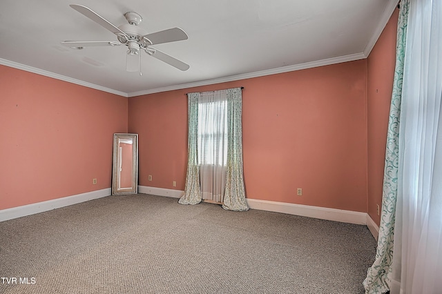 carpeted empty room with crown molding and ceiling fan