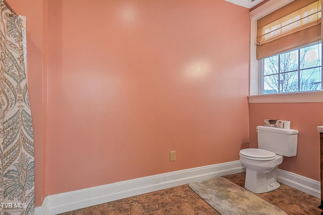 bathroom featuring toilet