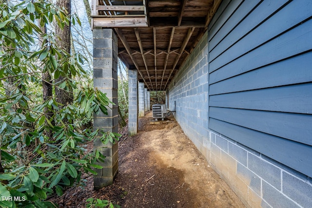 view of side of property with cooling unit