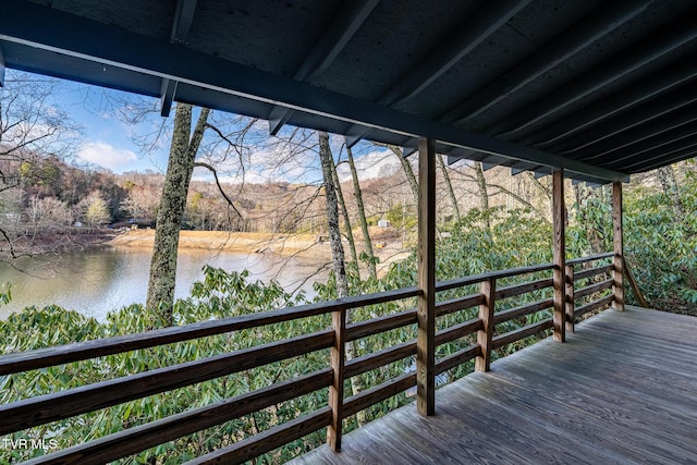 deck featuring a water view