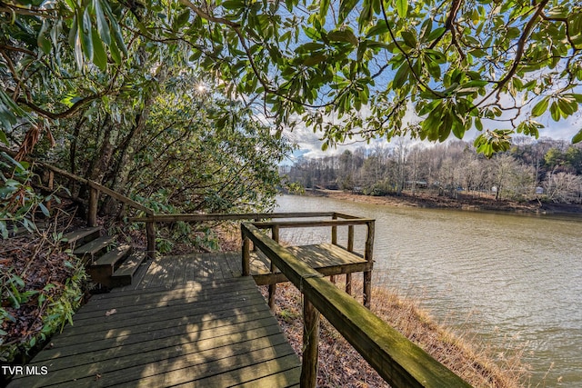 view of dock with a water view