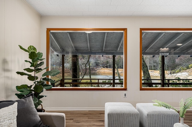 sitting room with hardwood / wood-style flooring