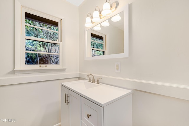 bathroom with vanity and plenty of natural light