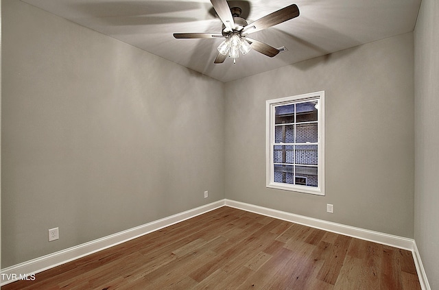 empty room featuring ceiling fan and light wood-type flooring