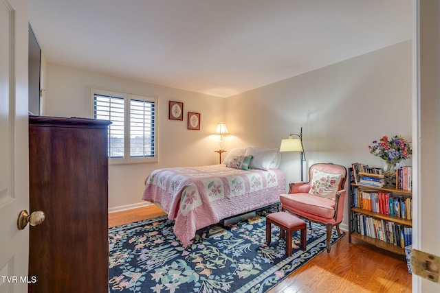 bedroom featuring hardwood / wood-style floors