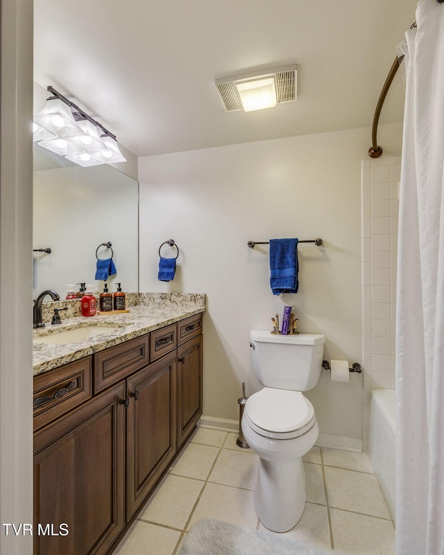 full bathroom featuring tile patterned flooring, vanity, shower / tub combo, and toilet