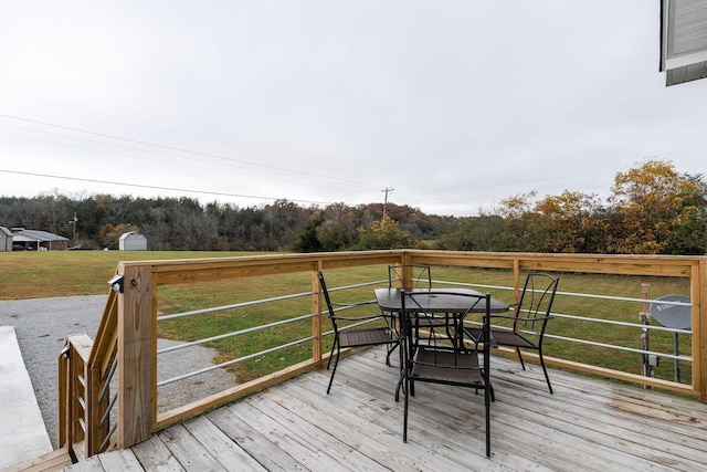 deck featuring a lawn