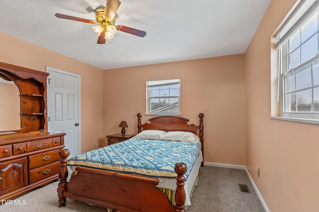 bedroom featuring ceiling fan and carpet floors