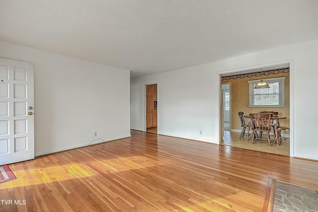 spare room featuring hardwood / wood-style flooring