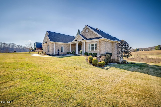 view of front of home with a front yard