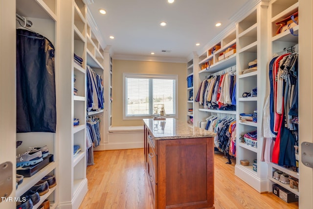 walk in closet featuring light wood-type flooring