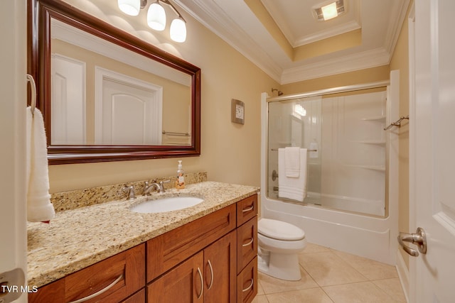 full bathroom featuring tile patterned floors, toilet, shower / bath combination with glass door, vanity, and ornamental molding