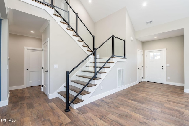 entryway with dark hardwood / wood-style floors