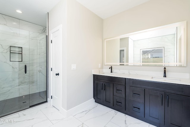 bathroom featuring vanity and an enclosed shower