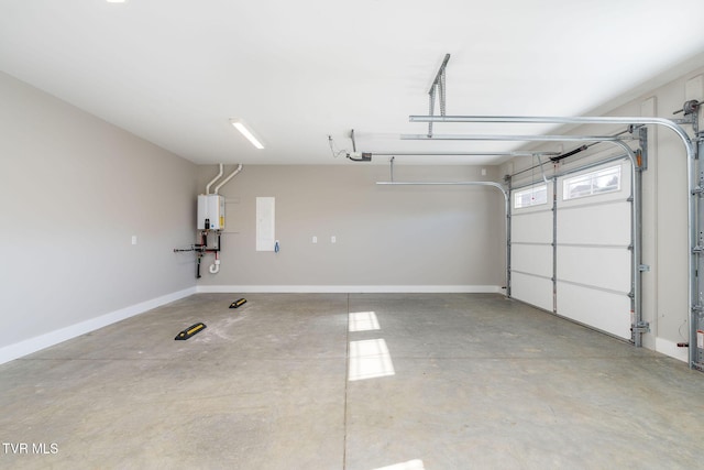 garage featuring water heater, a garage door opener, and electric panel