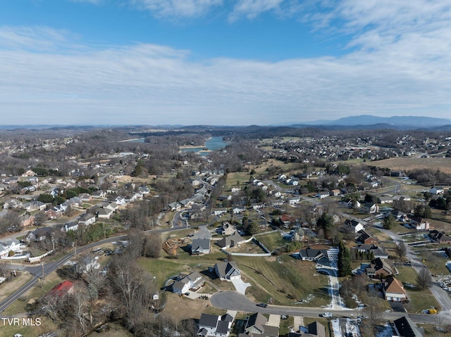 birds eye view of property featuring a mountain view