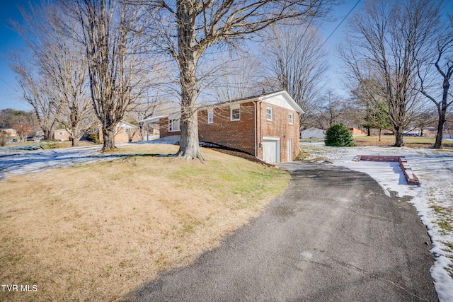 exterior space with a garage