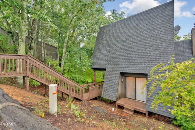 view of home's exterior with a deck