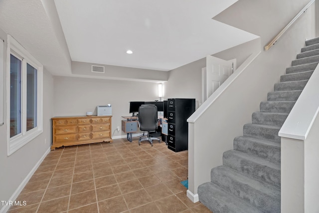 home office with tile patterned floors