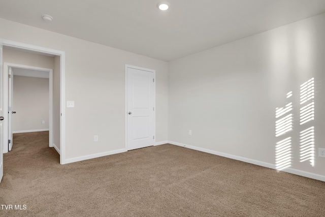 unfurnished bedroom featuring carpet