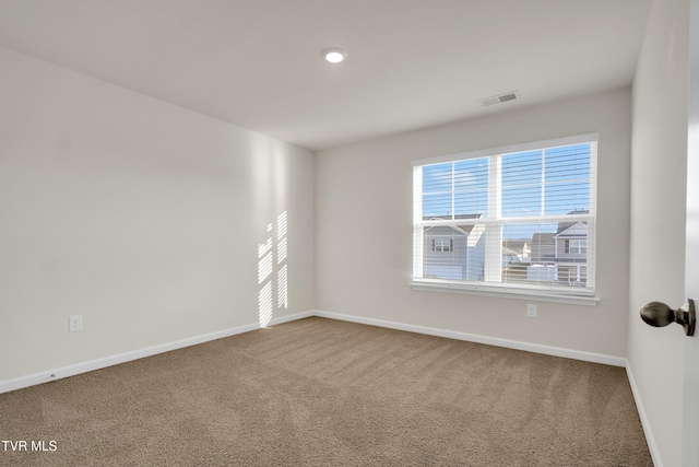 view of carpeted spare room