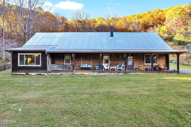 view of front of house with a front lawn and a porch