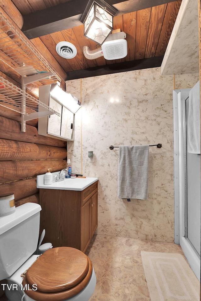 bathroom with beamed ceiling, vanity, toilet, and wood ceiling