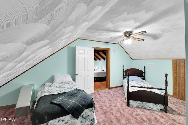 carpeted bedroom with ceiling fan and lofted ceiling