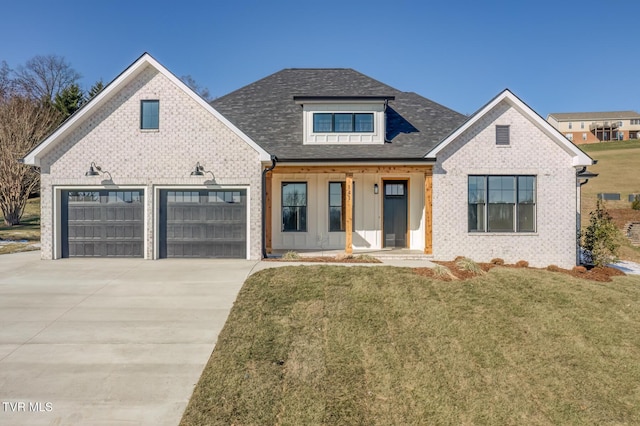 view of front of house featuring a front yard and covered porch