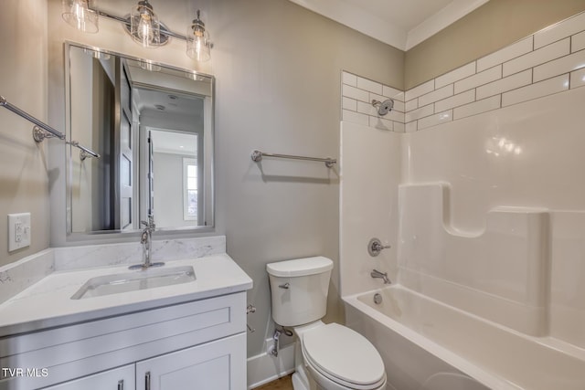 full bathroom featuring toilet, vanity, and  shower combination