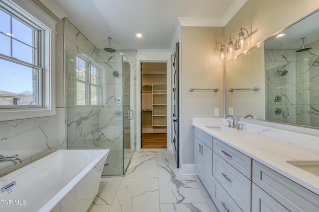 bathroom with separate shower and tub, vanity, and crown molding