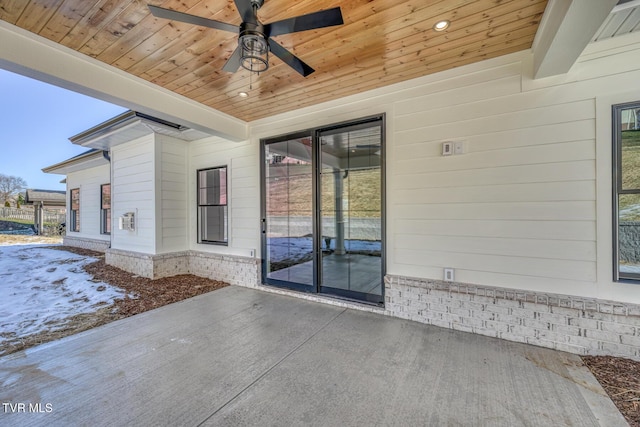 view of patio featuring ceiling fan